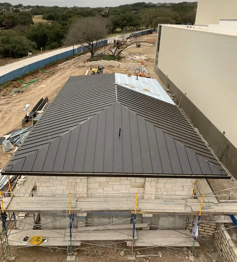Metal roof new construction with scaffolding in Redding